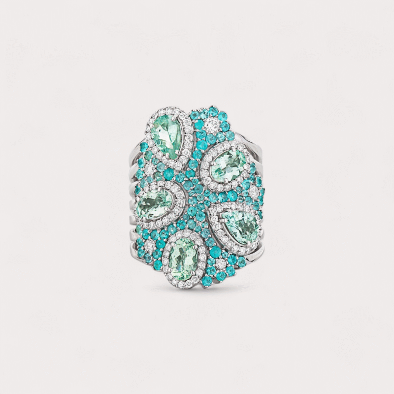 Anel em ouro branco 18k com 0,72ct em 99 diamantes e 3,22ct em 84 turmalinas paraiba